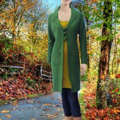 "*Long fitted vest/jacket made of 100% boiled wool. The boiled wool is knitted, so slightly stretching which makes it very comfortable to wear. Also the buttons are made of boiled wool. The inner and outer seams as well as the hems are finished with rustic cocotted stitches. With this design we have strived for a garment which is easy to recycle: on the way to a waste- free society where everything is recyclable or at least biodegradable we chose with this design to start from 100% monomaterial. Winter Wool Single-breasted Cardigan, Fitted Merino Wool Outerwear For Layering, Fitted Wool Coat For Cold Fall Weather, Cozy Fitted Sweater Coat For Fall, Wool Knitted Sweater Coat For Layering, Knitted Wool Sweater Coat For Layering, Fitted Knit Outerwear For Fall, Fitted Knit Sweater Coat For Fall, Fitted Long Sweater Coat For Cold Weather