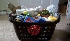 a basket full of toiletries sitting on the floor