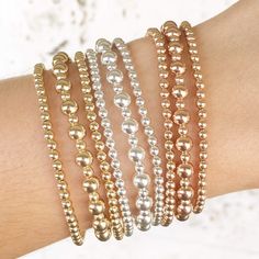 The Ready, Set, Stack Bracelet Set is the Jaimie Nicole version of classic bangles. This one and done beaded bracelet set is versatile, stylish, and makes a great base for anyone wanting to dip their toe into the big wide world of bracelet stacking! Looking to start yourself an arm party? What better way to begin than with our Ready, Set, Stack Bracelet Set? These stackable bracelets are a great way to start building the bracelet stack of your dreams! Available in your choice of gold, silver, ro Classic Rose Gold Jubilee Beaded Bracelet, Stackable Round Beads Bracelets In Rose Gold, Classic Rose Gold Stackable Bracelets, Elegant Beaded Bracelets With Polished Beads, Classic Rose Gold Round Beaded Bracelets, Dainty Rose Gold Stackable Beaded Bracelets, Rose Gold Stackable Beaded Bracelets, Stackable Rose Gold Beaded Bracelets, Elegant Stackable Adjustable Beaded Bracelets