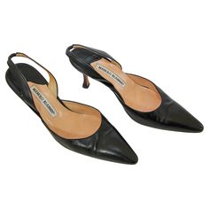 Manolo Blahnik Black Leather Slingback Pumps - Size 37. These timeless Manolo Blahnik pointed toe leather slingbacks were hand made in Italy. The back of the slingback is elastic for easy entry. These Manolo Blahnik pumps exudes an undeniably luxurious brand of sophistication. Heel height: 3". Size 37. Malono Blahnik, Manolo Shoes, Manolo Blahnik Pumps, Manolo Blahnik Black, Slingbacks, Heels Black, Slingback Pump, Dream Shoes, Manolo Blahnik