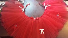 I can match almost any theme. You can add glitter tulle, numbers, letters or bows.  https://www.etsy.com/listing/193985108/high-chair-tutus-or-table-skirt? Tree Skirts, Christmas Tree Skirt