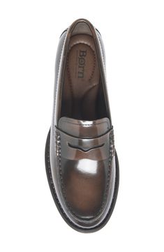 A low stacked heel and slightly exaggerated welt define this classic cushioned penny loafer crafted from rich leather. 3/4" heel Cushioned insole Leather upper/synthetic lining/rubber sole Imported Classic Slip-on Platform Loafers For Formal Occasions, Classic Formal Platform Loafers With Plain Toe, Classic Platform Loafers For Formal Occasions, Classic Formal Slip-on Platform Loafers, Classic Formal Platform Loafers, Classic Brown Platform Loafers With Brogue Detailing, Classic Platform Loafers With Round Toe, Classic Platform Loafers For Office, Classic Leather Platform Loafers For Formal Occasions