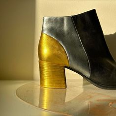 Vintage Leather Ankle Boots With Square Toe. Heel And Back Panel Have Been Given A Disco Re-Vamp With Gold And Silver Paint. Heel Is Gold On The Outside And Silver On The Underside For A Pop Of Surprise. Seen On A 5’3” Size 5.5/6 Human. Labeled A Size 9 Heel Height 2&1/4” Metallic High Heel Leather Boots, Silver Leather Heeled Boots For Fall, Metallic Leather Boots For Formal Occasions, Formal Metallic Leather Boots, Metallic Leather Heeled Boots With Pointed Toe, Silver Leather Heeled Boots For Formal Occasions, Formal Silver Leather Heeled Boots, Metallic Leather Boots For Evening, Silver Leather Heels For Fall