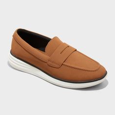 Get dressed for a day in the office and a night out with these Kobi Hybrid Loafer Sneakers from Goodfellow & Co™. These hybrid loafer sneakers showcase a cognac-color polyurethane upper and white TPR outsole. Featuring a pull-on design for easy on and off, these medium-width sneakers include a cushioned footbed and memory foam insole for extra comfortable wear. Goodfellow & Co™: Feel good in what you wear, anywhere. Classic Brown Low-top Slip-ons, Casual Wingtip Slip-ons For Business, Modern Brown Low-top Loafers, Brown Modern Low-top Loafers, Casual Brown Dress Shoes For Office, Brown Loafers With Ortholite Insole For Work, Casual Office Dress Shoes With Branded Insole, Brown Low-top Dress Shoes For Work, Brown Low-top Loafers For Business