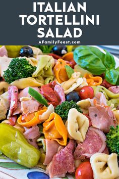 this italian tortellini salad is loaded with fresh vegetables and meats