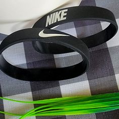 Set Of Two Nice Looking Pair Nike Black Bracelets White Lettering. Brand New! Stretchy Silicone / Rubber Fits Adults Fast Shipping!!! Marvel Young Avengers, Bronco 2, Sports Bracelet, Young Avengers, Rubber Bracelets, Nike Accessories, Nike Boy, Silicone Bracelets, Bracelet Men