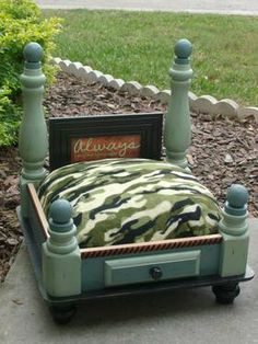 a bed made out of an old radio box and some green paint on the sides