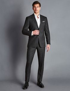 These suit trousers from Charles Tyrwhitt ensure you look polished, even after a long day at work. They cut a contemporary shape with their slim-fitting design and tapered hems. Woven from pure Super 120s wool, the trousers have natural stretch for added flex and comfort throughout the day. The subtly textured fabric also offers superb crease recovery to keep you looking sharp. Charcoal Grey Suit Men, Grey Suit Men, Dark Gray Suit, Charcoal Gray Suit, Interview Attire, Charcoal Suit, Prom 2024, Travel Size Beauty Products, Charles Tyrwhitt