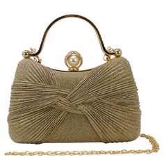 This stunning bow Shimmering clutch bag is the perfect accessory for a night out or any special occasions. The shimmering texture detailing is sure to catch the eye and add a touch of glamour to your outfit. The compact size is perfect for carrying just the essentials, and the clutch comes with a detachable metal chain strap for versatility. The bag features gold hardware, the clap is diamante rhinestone encrusted with a pearl on the inside. The two diamante encrusted grab handles lets you use it as a grab bag.  This sparkly bag is the perfect accessory for a wedding or party outfit. The glitter shades compliment party outfits. Pair with some matching sparkly shoes to stand out from the crowd. Dimension: W x H x D = 19cm x 12cm x 7cm approximately.      Perfect as a gift or present or just Glamorous Clutch For Prom, Glamorous Evening Bag For Party, Glamorous Evening Bag For Party Season Events, Elegant Gold Clutch For Prom, Glamorous Formal Clutch For Party Season, Elegant Clutch Bag With Bow, Elegant Bags With Bow For Party, Elegant Party Bag With Bow, Formal Rectangular Bag With Bow