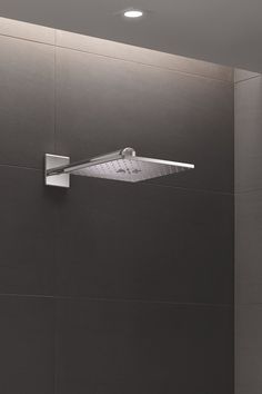 the shower head is mounted on the wall