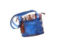 "Every day you will be more happy to have bought this stylish Denim messenger bag with zipper among others for its great comfort, its multiple pockets and its beautiful aesthetic. Size: height : 10.04\" (25,5 cm.) width  :  11.81\" (30 cm.) bottom of the bag : 1.77\" (4,5 cm.) 2 Denim straps with a length of   :  27.55\" (70 cm.) If you choose this Canvas and jute shoulder bag, in addition to wearing a nice bag, you will wear a unique piece made of stories from other lives and you will show your Denim Messenger Bag, Coffee Sack, Coffee Sacks, Upcycled Bag, Beautiful Aesthetic, Bag With Zipper, Upcycled Denim, Fun Bags, Last Minute Gifts