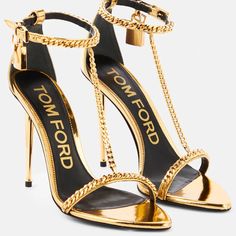 Tom Fordchain-Embellished Sandals. Metallic Nappa Leather In Gold. Straps With Signature Padlock Pendants. Closure: Buckle-Fastening Ankle Strap Lining: Leather Sole: Leather Insole And Sole Toe Shape: Pointed Open Toe Upper: Leather Comes With Dust Bags And A Box Made In Italy Size 38.5