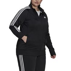 For a jacket that is both stylish and functional, try this Essentials warm-up tricot slim 3-stripes track jacket from adidas' women's plus collection. It's made from lightweight recycled fabric and features a classic-fit, mock neck, side pockets, and a zipper closure. Complete the look with a matching pair of track pants and sneakers. Closure Type: ZipperFit: Classic FitNeckline: Mock NeckPockets: 2 Side Slip PocketsSleeve Length: Long SleeveWarmth Factor: LightweightOuterwear Length: MidFiber C Fitted Athleisure Track Jacket For Jogging, Stretch Athleisure Track Jacket For Jogging, Winter Fitted Track Jacket For Jogging, Adidas Sportswear With Side Stripes, Sporty Long Sleeve Activewear With Three Stripes, Moisture-wicking Athleisure Outerwear For Jogging, Fall Athleisure Track Jacket With Three Stripes Branding, Fall Sportswear Track Jacket For Jogging, Stretch Sportswear Track Jacket For Jogging