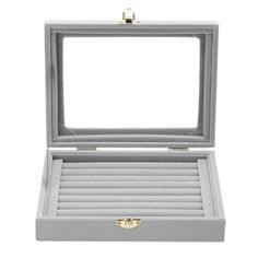 an open jewelry box on a white background