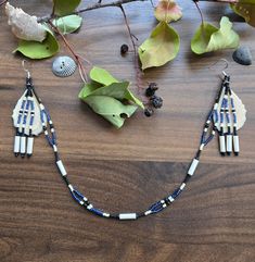 These jewelry sets are inspired by my very own culture🖤 Yup'ik Alaska Inuit agluirutet, a 2-in-1 Inuit style attached necklace+earrings set. This set can be worn with or without the chin decoration! Hung from silver toned hypoallergenic hooks, this is made with caribou antler slices that my Apa (grandfather) had at fishcamp, family treasures. With antique bone tube beads and blue, black and antique white beadwork Southwestern Style Black Beads Jewelry For Gift, Artisan Jewelry With Black Beads, Southwestern Style Black Bead Jewelry For Gifts, Southwestern Style Jewelry With Black Beads For Gift, Traditional Black Beads Jewelry For Crafting, Artisan Black Beads Dangle Jewelry, Artisan Black Bead Dangle Jewelry, Artisan Black Beaded Dangle Jewelry, Traditional Black Beaded Jewelry For Crafting