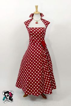 This crazy cool retro style dress of red with white polka dots is the perfect vamp outfit for parties and events!  The dress has a beautiful square neckline with a stand up pointed collar and cap sleeves.  The skirt is very full with pleating on the left side accented with a red bow at the waist. #ggr #glitzglamandrebellion #pinupdress #pinupstyle #vintageinspired #partydress #rockabillydress #retrofashion #50sstyle #hostessdress Polka Dot Square Neck Dress For Parties, Polka Dot Square Neck Party Dress, Fitted 1950s Style Polka Dot Dress, Fitted Polka Dot Dress In 1950s Style, Retro Square Neck Party Dress, Red Fitted Tea-length Dress, Fitted Polka Dot Dress With Square Neck, Vamp Outfit, 50s Beauty