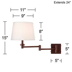 a wall light with measurements for the lamp and shade on each side, which is 11 inches tall