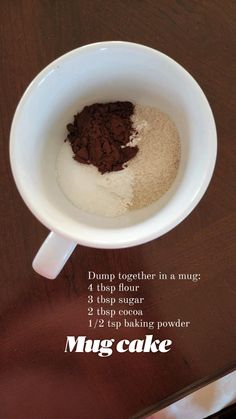 there is a cup with some food in it on top of a table and instructions for how to make mug cake