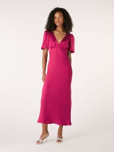 Rosie is as effortless as she is elegant. Short balloon sleeves playfully draped in our signature recycled satin add a twist of texture to this classic neckline. Maxi in length with a tie at the back so you can adjust the fit to suit your shape. Rosie is the dress that does it all. Timeless Clothes, Twist Front Dress, Cerise Pink, Puff Sleeve Dress, Puffed Sleeves Dress, Twist Front, Affordable Clothes, Balloon Sleeves, Denim Top