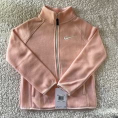 New!! Girls Nike Pink Zip Up Jacket. Size 6 (M). Nike Define Jacket, Long Sleeve Fleece Jacket For Spring, Cute Long Sleeve Outerwear For Outdoor, Spring Long Sleeve Fleece Jacket, Cute Fleece Outerwear For Winter, Sporty Long Sleeve Fleece Jacket For Spring, Sporty Long Sleeve Spring Fleece Jacket, Nike Pink Sporty Outerwear, Sporty Pink Nike Outerwear