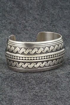 This stunning sterling silver bracelet was made by Navajo silversmith Raymond Delgarito. The back is signed RD and stamped sterling.Size: 5 1/4" (will fit up to a 6 1/4" wrist)Gap: 1"Width: 1 1/4"Free shipping on all orders! We ship with USPS and always include tracking. All orders ship within a day of payment.Returns are accepted up to 30 days after you receive your order. Just send us a message. Our shop offers cash back or store credit. The item must be returned in new condition. Silver Jewelry Handmade, Sterling Silver Bracelet, Native American Jewelry, Free Jewelry, Sterling Silver Bracelets, Jewelry Crafts, Favorite Jewelry, Silver Bracelet, Jewelry Watches