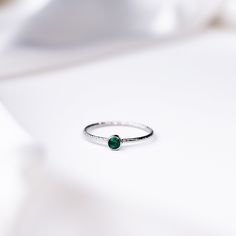 "Stylish and minimalist 14k birthstone ring for everyday wear. Wonderful and unique gift idea to show love to the important people in your life with a cute, dainty, and creative gift. This birthstone ring makes a perfect birthday gift for mothers, friends or yourself. Also a special anniversary gift for significant others. We only use the highest quality 925 sterling silver or 14 solid gold in our workshop.  ♥ All our jewelry is custom made by hand with love, care and passion in our workshop. ✿ White Gold Solitaire Ring For May Birthstone, Dainty Birthstone Midi Rings For Gifts, Fine Jewelry Sterling Silver Stackable May Birthstone Rings, White Gold Stackable May Birthstone Ring, Stackable Emerald Ring For Everyday Wear, Classic Everyday Sterling Silver Birthstone Ring, Everyday Stackable Round Emerald Ring, Everyday Green Stackable Rings With Bezel Setting, Stackable Everyday Emerald Ring