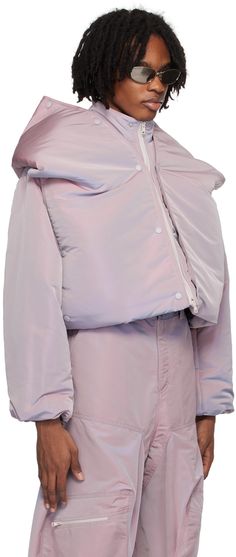 Padded polyester taffeta puffer jacket. Integrated extended hood-style overlay for alternate styling. · Layered construction · Stand collar · Two-way zip closure · Logo bonded at front · Welt pockets · Concealed bungee-style drawstring at cropped hem · Welt pocket at interior · Full taffeta lining Supplier color: Iridescent lilac Spring Nylon Puffer Jacket For Streetwear, Spring Nylon Puffer Jacket With Padded Collar, Trendy Nylon Puffer Jacket With Zipper Closure, Spring Functional Hooded Puffer Jacket, Functional Nylon Outerwear With Zip Cuffs, Functional Puffer Jacket With Detachable Hood For Spring, Functional Nylon Puffer Jacket For Spring, Spring Functional Streetwear Puffer Jacket, Functional Spring Puffer Jacket For Streetwear