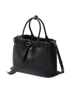 Find PRADA Buckle Leather Handbag on Editorialist. This Prada leather handbag features a roomy silhouette with an interchangeable belt. The bag is crafted from leather with a nappa leather interior. The bag features an adjustable shoulder strap, top handles, and a center pocket. The bag has an embossed logo on the front and measures 14.7 inches wide, 10.8 inches high, and 15 inches long. Large Leather Handbags, Crocodile Handbags, Unique Handbags, Prada Leather, Black Leather Handbags, Prada Handbags, Brown Bags, Strap Top, Embossed Logo