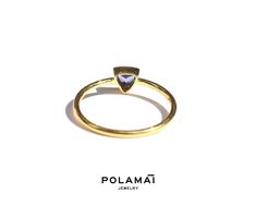 Tanzanite Ring 14k Gold . Trillion Ring . Solid Gold Gemstone Ring .Triangle Ring . Stacking Ring. Yellow White Gold Ring . Polamai One flawless, trillion cut, natural Tanzanite gemstone set in solid gold. Fans of tanzanite will know that this stone has an incredible intensity. We use only top grade, flawless tanzanite for this design. Available in white, yellow and rose 14k gold. ❂ Stone: Natural Tanzanite (origin Tanzania) ❂ Stone Size: 5 x 5mm approximately. ❂ Stone Quality: AAA Flawless ❂ Ri Modern Yellow Gold Tanzanite Jewelry, Formal Yellow Gold Trillion Cut Jewelry, Trillion Cut Yellow Gold Rings For Formal Occasions, Trillion Cut Solitaire Rings For Formal Occasions, Formal Solitaire Rings With Trillion Cut, Formal Trillion Cut Solitaire Rings, 14k Gold Trillion Cut Sapphire Ring, Modern Gold Jewelry With Trillion Cut, Trillion Cut Sapphire Ring In 14k Gold