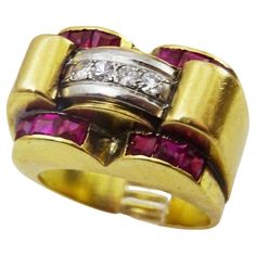 A classic example of Tank rings which were very fashionable in the 1930's and 40's. Made in acid tested 18 karat gold. In the top of the ring we have a white gold panel set with 4 2 point diamonds. On the flanks to front and back there are set 12 2 mm square rubies. Total ruby weigh 70 points. The Ring is size 6 3/4 American - 14.5 European and can be resized before delivery. Retro Yellow Gold Rings Stamped 14k, Modernist Diamond Ring For Formal Occasions, Retro Rings With Polished Finish For Formal Occasions, Retro Formal Rings With Polished Finish, Retro Polished Rings For Formal Events, Modernist Wide Band Ring For Formal Occasions, Retro 14k Gold Formal Rings, Retro 14k Gold Rings For Formal Occasions, Vintage Platinum Ruby Ring For Formal Occasions