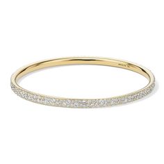 The luxurious sparkle of a 6.39ctw pave of diamonds basks in the warm glow of 18K gold in a perfect circle. The back of the bangle is purposely kept solid, so that your movements will highlight in turn either the metal or the precious stones. This sleek, subtle piece is the perfect foundation of a luxe stack.• 18K Gold• Gemstones: Diamond• Diamond Carat Weight: 6.39 Luxury Gold Bracelet, Ippolita Jewelry, 18k Gold Bangle, Pave Bangle, Hinged Ring, Perfect Circle, Fashion Jewelry Sets, A Perfect Circle, Perfect Foundation