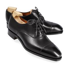 WOMEN'S OXFORDS IN BLACK VITELLO Classic Cap Toe Lace-up Shoes For Galas, Classic Cap Toe Oxfords For Galas, Classic Oxfords With Rubber Sole For Galas, Timeless Black Oxfords With Round Toe, Cap Toe Oxfords With Rubber Heel Cap For Galas, Timeless Black Almond Toe Oxfords, Classic Black Cap Toe Lace-up Shoes, Classic Lace-up Dress Shoes For Galas, Goodyear Welted Oxfords For Galas