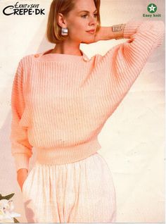 a woman in pink sweater and white pants posing for a magazine cover with her hand on her hip