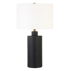 a black table lamp with a white shade