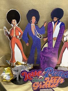 paper cutouts of the jackson brothers on display