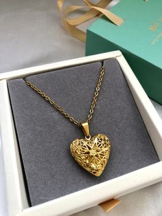 Beautiful Heart-Shaped Medallion Necklace. Made in stainless steel, highly gold polished. Can open as seen on a photo. An ideal accessory for any occasion. It's the perfect gift for your girlfriend, mom or best friend. It comes in a beautifully designed box, ready to be presented to that someone special of yours. Whether you're expressing your love, celebrating a special moment, or simply embracing your own beauty, this necklace is a symbol of timeless elegance.✨💛 All of our items are nicely packaged ready to gift in elegant jewelry boxes 🎁✨ Length: 50cm If you have have any questions don't doubt getting in touch with me, I will be delighted to answer you❤️ Gold Double Heart Locket Necklace Gift, Gold Open Heart Locket Necklace Gift, Elegant Gold Heart Locket Necklace, Wedding Heart Pendant Gold Plated Locket Necklace, Elegant Heart Pendant Locket Necklace In Metal, Elegant Heart Pendant Locket Necklace, Metal Heart Necklace For Valentine's Day Wedding, Gold Heart-cut Locket Necklace For Gift, Elegant Metal Heart Pendant Locket Necklace