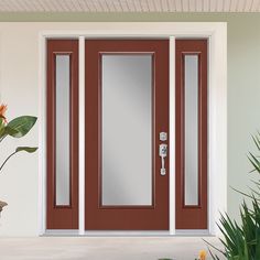 a red front door with two sidelights and glass panels on the sides, next to a potted plant