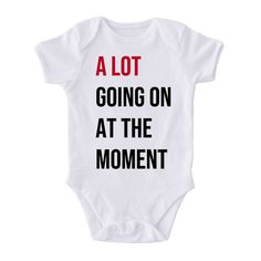 This baby bodysuit is the cutest Swiftie baby ensemble! Our white infant bodysuits are made with 100% Cotton official Gerber Onesies® brand bodysuits. Available in short or long sleeves. See size chart in Details tab below.

Shop our entire Eras Collection here! White Pre-shrunk Cotton Onesie, Fitted White Short Sleeve Bodysuit With Letter Print, White Fitted Short Sleeve Bodysuit With Graphic Print, White Short Sleeve Bodysuit With Graphic Print, Fitted White Onesie For First Birthday, White Fitted Onesie For First Birthday, White Bodysuit With Name Print For First Birthday, White Short Sleeve Onesie For First Birthday, Funny Short Sleeve White Onesie