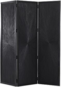 a black room divider with an intricate design on the front and back panels,