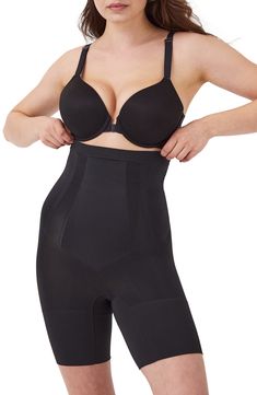 This sculpting shaper is lightweight and powerful, featuring fully-bonded front-panels for a flat stomach and edge-bonded side panels for squeeze-free slimming. Support level: sculpt Comfortable sculpting power with less bulk Lined double gusset Bonded tummy panel Side panels for squeeze-free slimming and easy movement Leg openings stay invisible under clothing Easy double-gusset opening 80% nylon, 20% spandex Machine wash, dry flat Imported Mid Thigh Shorts, Flat Stomach, Body Shapers, Side Panels, Who What Wear, Panel Siding, High Waisted Shorts, Shapewear, Hosiery