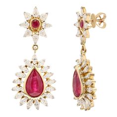 This is part of Chairish’s Fine Jewelry assortment.  Diamond Ruby Wedding Dangle Earrings in 18K Gold with Diamonds to make a statement with your look. These earrings create a sparkling, luxurious look featuring oval cut gemstone. If you love to gravitate towards unique styles, this piece of jewelry is perfect for you.  PRODUCT DETAILS :-  Material - 18K Solid Yellow Gold Gemstone - Ruby   Gemstone Weight - 4.37 ct Gemstone Shape - Pear, Round Gemstone Pcs - 4 Gemstone Size - 6 x 9, 2 mm Diamond Weight - 1.95 ct Diamond Size - 1.5 x 3 mm Gross Weight - 7.963 Grams Setting - Prong setting Length - 32 mm  Width - 22 mm Wedding Dangle Earrings, Dangle Earrings Wedding, Ruby Wedding, Gift Girlfriend, Gift Valentine, Ruby Earrings, July Birthstone, Girlfriend Gift, Accessories Jewelry Earrings