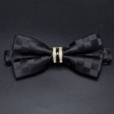 Look your best with this classic Luxury Bowtie. Steeped in timeless style, it will instantly elevate any outfit. Crafted from the highest quality fabric, this bow tie is designed for comfort, durability and style. SPECIFICATIONS Size: One SizeSIZE: 12*6CMMaterial: Polyester