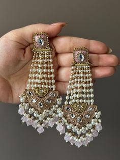 Indulge in royal appeal with these high quality meenakari work chandbali earrings. These perfectly light weight earrings are saw to attract compliments your way.  In case of any queries, please feel free to reach out to us. Happy shopping! Luxury Chandbali Bridal Sets, Luxury Chandbali Bridal Sets For Formal Occasions, Luxury Chandbali Danglers With Latkans, Luxury Bollywood Chandbalis With Zari Work, Luxury Chandbali Cutdana Earrings, Luxury Handmade Chandbali Jewelry Sets, Luxury Chandbali Jeweled Danglers, Kundan Chandbali, Onion Pink