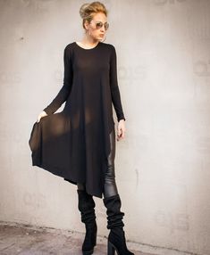 Black Asymmetric Top / Asymmetric tunic / Women Black Top / Women Tunic / Plus Size top / Plus Size Tunic / Plus Size Clothing / #35309 Asymmetric blouse with Long sleeves. Wear it with your jeans or tights . SEE COLOR CHART HERE : https://www.etsy.com/listing/235259897/viscose-color-chart?ref=shop_home_active_4 - Handmade item - Materials : viscose * Please Note : To keep a stock of a large variety of colors, they may have slight differences in weight and drape - The model wears : size - small Lagenlook Asymmetrical Dress For Fall, Black Long Sleeve Asymmetrical Dress For Spring, Fitted Asymmetrical Lagenlook Top, Fitted Lagenlook Tunic For Fall, Black Asymmetrical Tunic For Spring, Casual Black Asymmetrical Long Sleeve Dress, Casual Asymmetrical Dress For Fall, Casual Black Long Sleeve Asymmetrical Dress, Black Long Sleeve Asymmetrical Casual Dress