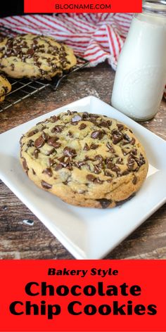 a chocolate chip cookie sitting on top of a white plate next to a glass of milk