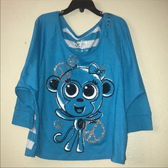 Justice, Girls Blue Top With Cute Monkey Print Front And Gray Stripes On Back. 3/4 Long Sleeves. Size 10. Brand New. Cute Long Sleeve Blue Tops, Playful Blue Long Sleeve Top, Blue Long Sleeve Playful Top, Blue Trendy Top With 3/4 Sleeves, Justice Clothes, Clothes Haul, Justice Store, Dancer Shirt, Avocado Shirt