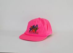 PLEASE NOTE: COLOR IS HOT / FLUO PINK, THE ACTUAL COLOR IS NOT CAPTURED WELL IN THE PICS... New unworn 90s hat with Telly's Sporting bar, from Hollywood California logo in front, adjuster in the back see all images for details Brand: Otto Made in Thailand One Size Material Polyester / Cotton Info: Machine Washable suggested Hand Wash Please, read our shop policies before purchasing. Please, contact if you have any more questions. Pink 5-panel Snapback Hat For Streetwear, Pink Sports Hats For Summer, Retro Pink Hat With Flat Brim, Pink Flat Bill Snapback Hat For Sports, Pink Baseball Cap For Summer Sports, Pink Flat Bill Sports Hat, Adjustable Retro Snapback Hat For Sports, Retro Pink Flat Brim Hat, Pink Summer Sports Baseball Cap