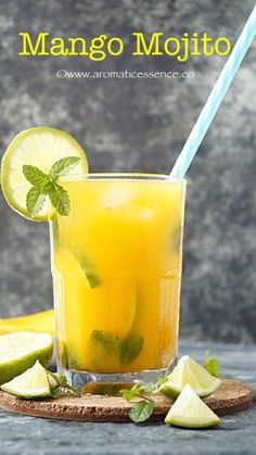 the mango mojito is garnished with lime and mint