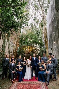 a bride and groom with their bridal party