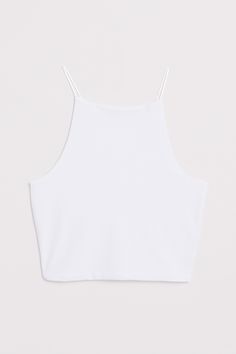 This singlet features a spaghetti strap, a racerback style, cropped length and a stretchy material in jersey. White Stretch Cami Halter Top, White Stretch Halter Cami Top, White Stretch Racerback Crop Top, White Stretch Crop Top Tank, White Racerback Camisole For Summer, White Stretch Halter Tank Top, White Halter Top With Tank Straps For Spring, White Stretch Tank Crop Top, White Seamless Sleeveless Crop Top